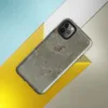 Glossy Weathered Plaster Wall Tough Case for iPhone — close-up of aged sage green plaster peeling away in irregular patches