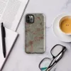 Glossy Crumbling Plaster Brick Wall Tough Case for iPhone — aged plaster wall peeling away to reveal terracotta brick