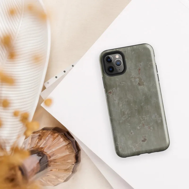 Glossy Weathered Green Metal Patina Tough Case for iPhone — aged olive-green corroded metal surface with scattered rust