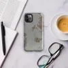 Glossy Urban Decay Rust Texture Tough Case for iPhone — weathered gray surface with scattered patches of rust, burnt sienna