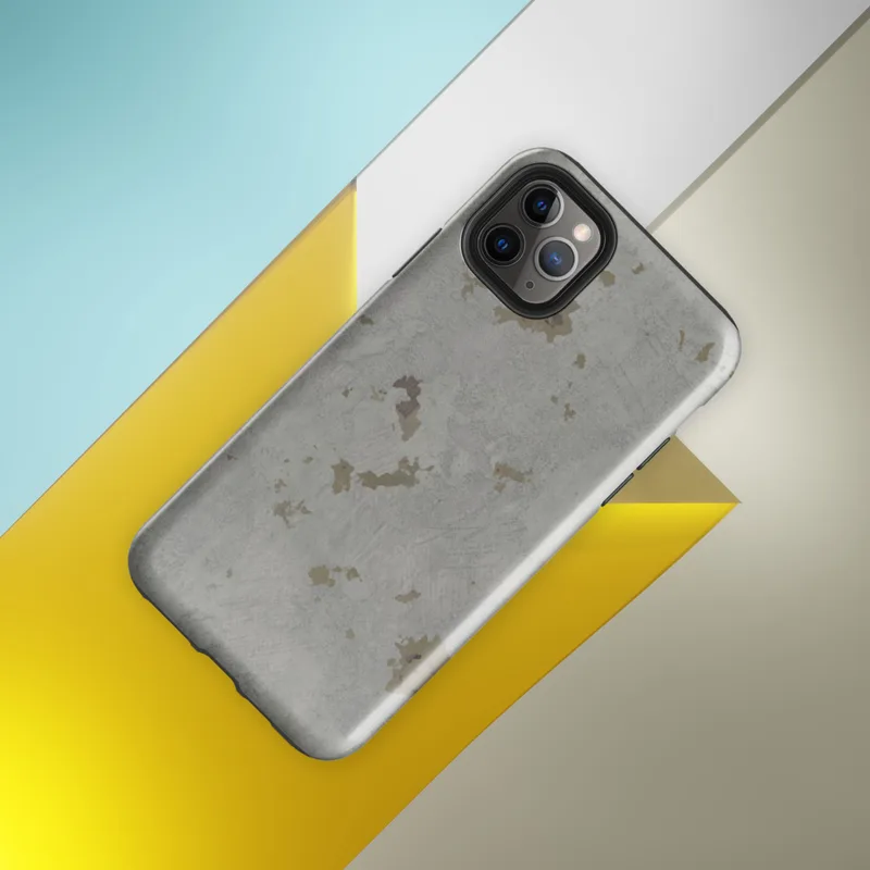 Glossy Weathered Concrete Texture Tough Case for iPhone — weathered grey concrete surface with scattered aged golden-brown