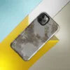 Glossy Urban Decay Exposed Brick Tough Case for iPhone — weathered wall with peeling white plaster revealing rusty brown
