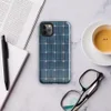 Glossy Solar Grid Power Tough Case for iPhone — close-up repeating grid of deep navy and teal blue solar photovoltaic cells