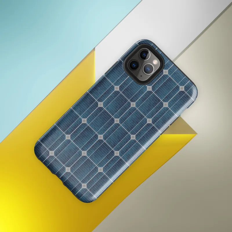 Glossy Solar Grid Power Tough Case for iPhone — close-up repeating grid of deep navy and teal blue solar photovoltaic cells
