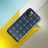 Glossy Solar Panel Tech Tough Case for iPhone — close-up repeating grid of deep navy blue octagonal solar cells with silver