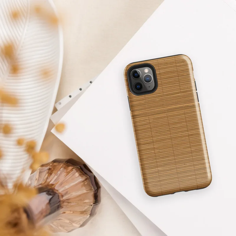Glossy Woven Bamboo Mat Tough Case for iPhone — closely woven bamboo reed mat texture in warm golden and amber tones