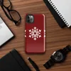 Glossy Winter Snowflake Trio Tough Case for iPhone — three identical white geometric snowflakes arranged in a row on a deep