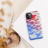 Glossy Red Wave Blue Tide Tough Case for iPhone — fluid abstract waves of vivid red and electric blue merging through