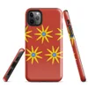 Glossy Solar Bloom Red Tough Case for iPhone — repeating pattern of yellow sunburst flowers with blue centers on a vivid red