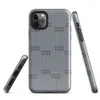 Glossy Steel Grid Dot Matrix Tough Case for iPhone — repeating grid of dark circular dots arranged in pairs on a cool