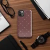 repeating ivory cross and dash marks scattered across a rich burgundy red textured background in a folk embroidery style on Glossy Crimson Cross Stitch Tough Case for iPhone - default view