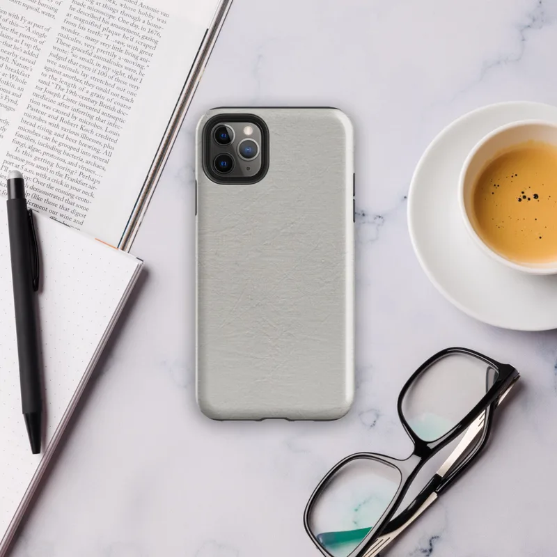 soft crinkled linen fabric texture in muted stone grey with subtle natural fiber detail and organic surface variation on Glossy Stone Linen Texture Tough Case for iPhone - default view