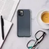close-up dark navy denim fabric texture with subtle vertical weave grain and muted indigo tones on Glossy Dark Denim Texture Tough Case for iPhone - default view
