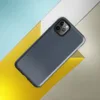 close-up dark navy denim fabric texture with subtle vertical weave grain and muted indigo tones on Glossy Dark Denim Texture Tough Case for iPhone - default view