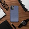 diagonal twill weave pattern in deep navy and slate blue, resembling woven fabric with fine alternating stripes on Glossy Navy Twill Weave Tough Case for iPhone - default view