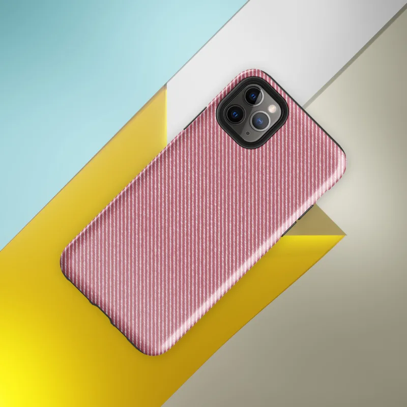 diagonal white pinstripes on a warm muted red background mimicking a woven twill fabric texture on Glossy Classic Red Diagonal Twill Tough Case for iPhone - default view