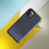 diagonal twill carbon fiber weave in deep navy blue and dark slate with alternating light-catching bands on Glossy Midnight Carbon Fiber Shield Tough Case for iPhone - default view