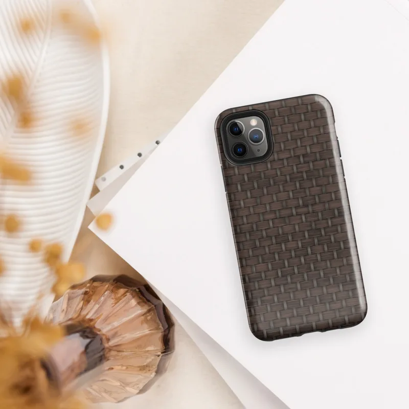 close-up realistic dark brown woven wicker basket weave pattern with interlaced strands and subtle light shading on Glossy Dark Woven Wicker Texture Tough Case for iPhone - default view