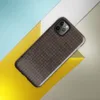 close-up realistic dark brown woven wicker basket weave pattern with interlaced strands and subtle light shading on Glossy Dark Woven Wicker Texture Tough Case for iPhone - default view