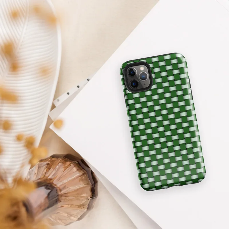 repeating woven basket weave grid in deep forest green and soft mint white creating a three-dimensional optical illusion effect on Glossy Green Woven Grid Illusion Tough Case for iPhone - default view