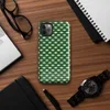 repeating woven basket weave grid in deep forest green and soft mint white creating a three-dimensional optical illusion effect on Glossy Green Woven Grid Illusion Tough Case for iPhone - default view