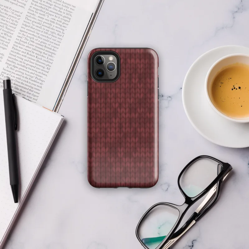 close-up chunky knit sweater texture in deep crimson red with subtle tonal variation and interlocking stitch rows on Glossy Crimson Knit Texture Tough Case for iPhone - default view