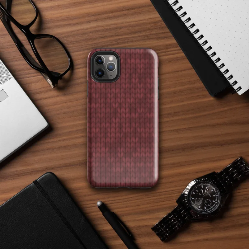 close-up chunky knit sweater texture in deep crimson red with subtle tonal variation and interlocking stitch rows on Glossy Crimson Knit Texture Tough Case for iPhone - default view