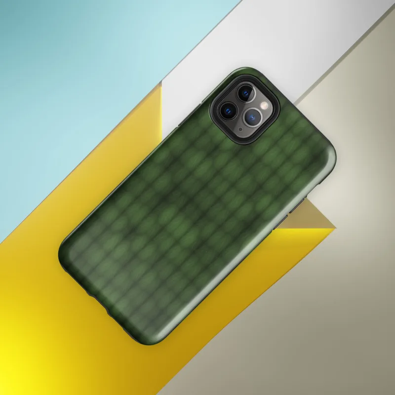 deep forest green grid of rounded cells with shadowed figure shapes emerging subtly from the repeating textile-like pattern on Glossy Shadow Grid Green Texture Tough Case for iPhone - default view
