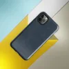 seamless horizontal woven fabric texture in deep navy and slate indigo tones with subtle tonal variation on Glossy Deep Navy Textile Tough Case for iPhone - default view