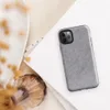 soft heathered gray surface with subtle organic texture variation resembling brushed stone or fine wool in muted silver tones on Glossy Storm Gray Minimalist Shield Tough Case for iPhone - default view