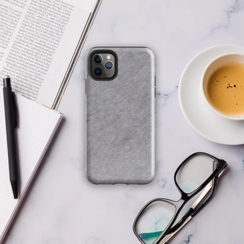 soft heathered gray surface with subtle organic texture variation resembling brushed stone or fine wool in muted silver tones on Glossy Storm Gray Minimalist Shield Tough Case for iPhone - default view
