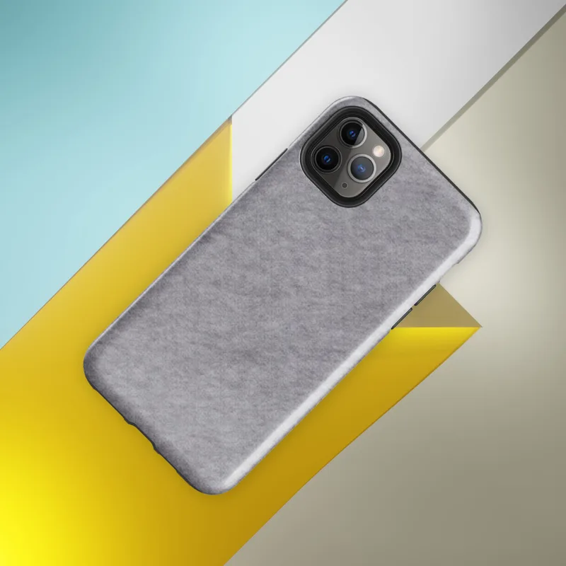 soft heathered gray surface with subtle organic texture variation resembling brushed stone or fine wool in muted silver tones on Glossy Storm Gray Minimalist Shield Tough Case for iPhone - default view