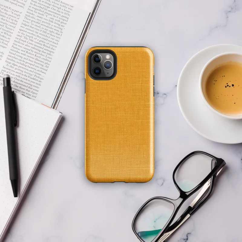 close-up woven linen fabric texture in warm golden amber and saffron tones with subtle thread detail on Glossy Golden Linen Texture Tough Case for iPhone - default view