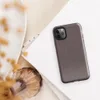 fine dark checkerboard weave pattern in deep charcoal and muted burgundy tones on a near-solid dark background on Glossy Dark Woven Texture Classic Tough Case for iPhone - default view