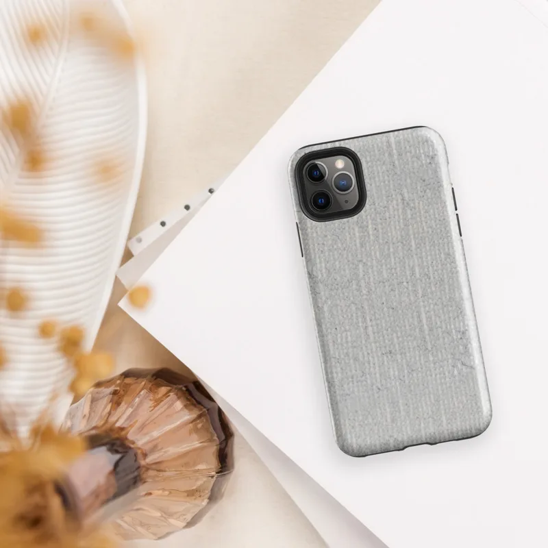 close-up of a light gray ribbed concrete surface with subtle vertical striations and organic weathered variation on Glossy Stone Gray Ribbed Texture Tough Case for iPhone - default view
