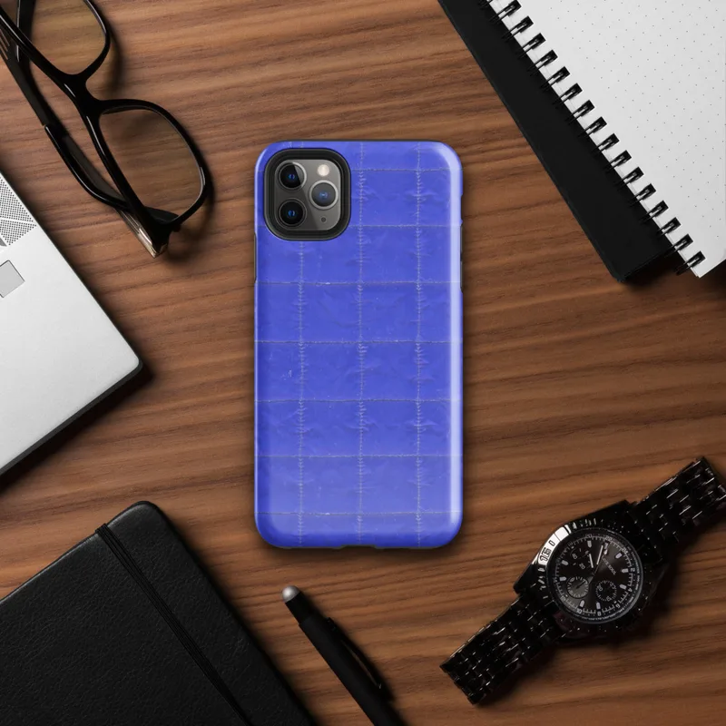deep royal blue quilted grid pattern with subtle stitched lines forming uniform rectangular panels across the entire surface on Glossy Royal Blue Quilted Grid Tough Case for iPhone - default view