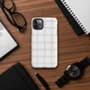 soft white quilted grid pattern with puffed squares and subtle stitched seams on a pale background on Glossy Cloud White Quilted Texture Tough Case for iPhone - default view