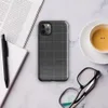 repeating dark charcoal quilted square grid pattern with faint stitched seams and subtle fabric-like texture on Glossy Dark Quilted Grid Tough Case for iPhone - default view