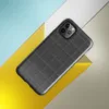 repeating dark charcoal quilted square grid pattern with faint stitched seams and subtle fabric-like texture on Glossy Dark Quilted Grid Tough Case for iPhone - default view