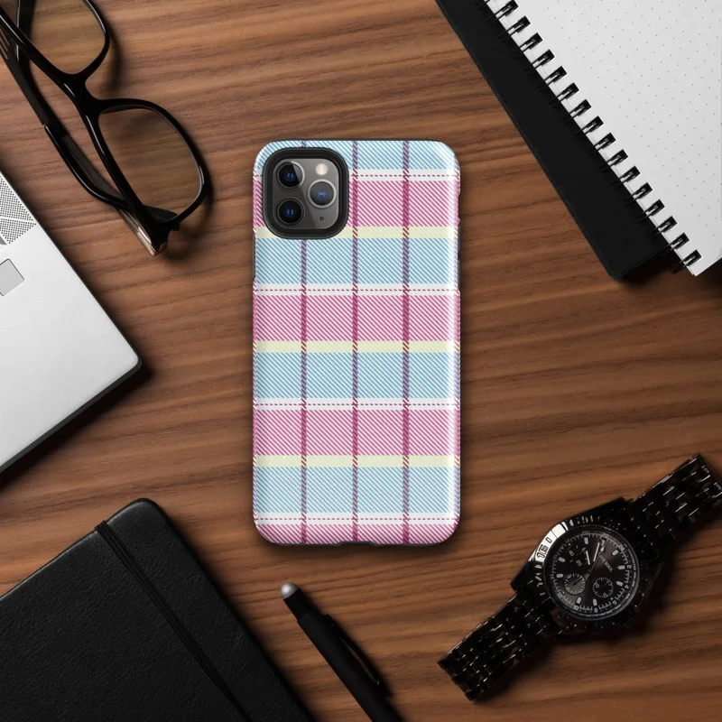 classic tartan plaid pattern in pastel sky blue, pale yellow, and bold magenta pink with fine diagonal hatching on a white background on Glossy Pastel Plaid Preppy Tough Case for iPhone - default view