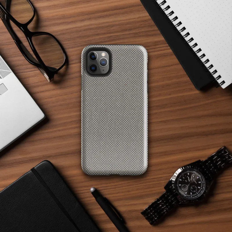 micro-checkerboard pattern in slate gray and warm sand with subtle colorful flecks and fine thread-like lines suggesting woven fabric on Glossy Steel Grid Woven Texture Tough Case for iPhone - default view