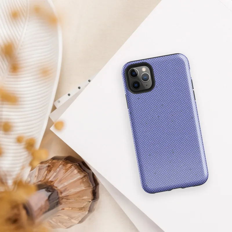 fine checkerboard micro-grid pattern in soft periwinkle and slate blue with subtle distressed flecks throughout on Glossy Periwinkle Pixel Grid Tough Case for iPhone - default view