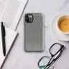 close-up checkerboard weave pattern with teal and natural linen tones mimicking woven tatami or basket textile on Glossy Woven Slate Grid Tough Case for iPhone - default view