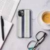 vertical ticking stripe pattern with wide navy blue bands, crisp white panels, and narrow taupe pinstripe accents on woven textile texture on Glossy Coastal Ticking Stripe Classic Tough Case for iPhone - default view