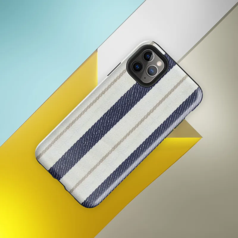 vertical ticking stripe pattern with wide navy blue bands, crisp white panels, and narrow taupe pinstripe accents on woven textile texture on Glossy Coastal Ticking Stripe Classic Tough Case for iPhone - default view