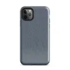 close-up diagonal twill weave of faded blue denim fabric with subtle tonal variation and natural thread texture on Glossy Classic Denim Weave Tough Case for iPhone - default view