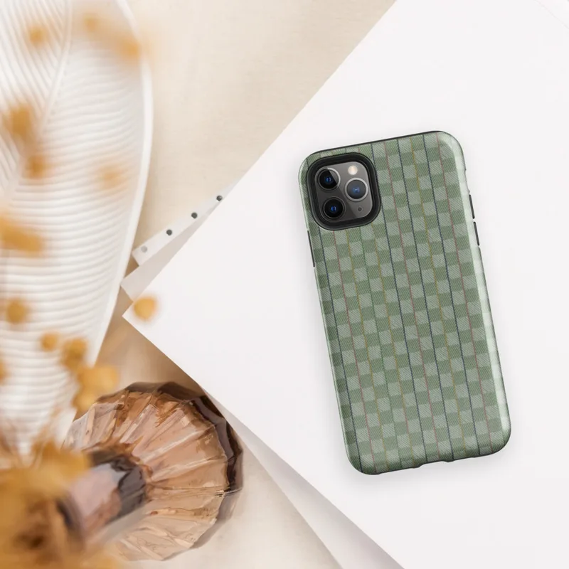basketweave grid pattern in sage and muted green with thin vertical pinstripes in navy, dusty rose, and golden yellow on Glossy Garden Plaid Stripe Tough Case for iPhone - default view