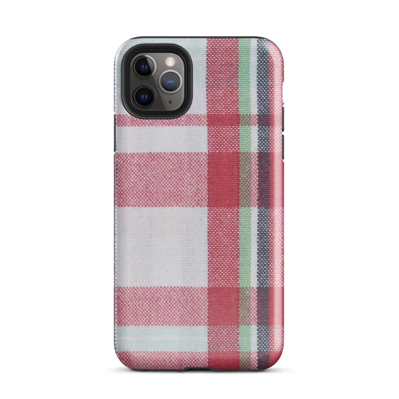 traditional tartan plaid pattern with bold red, navy, forest green, and white intersecting woven stripes on Glossy Classic Plaid Heritage Tough Case for iPhone - default view