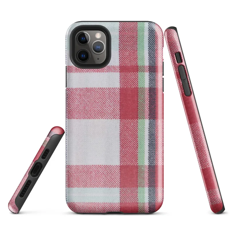 traditional tartan plaid pattern with bold red, navy, forest green, and white intersecting woven stripes on Glossy Classic Plaid Heritage Tough Case for iPhone - default view