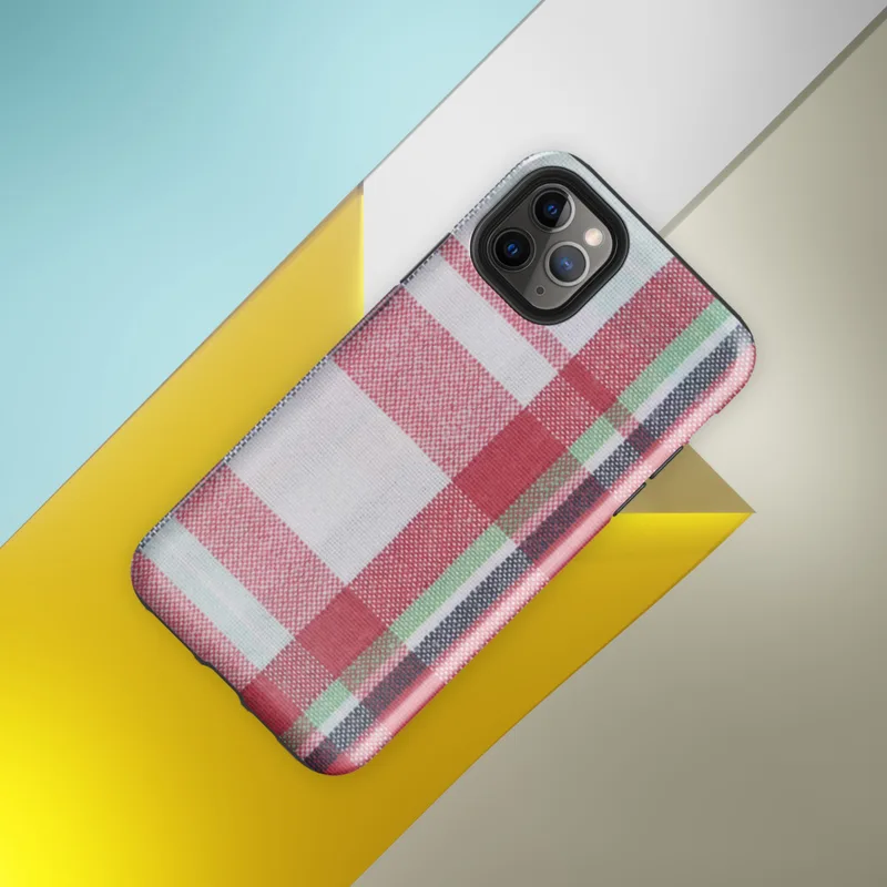 traditional tartan plaid pattern with bold red, navy, forest green, and white intersecting woven stripes on Glossy Classic Plaid Heritage Tough Case for iPhone - default view